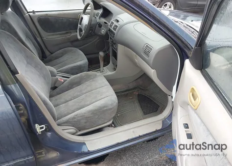 2000 Toyota Corolla Le z USA, uszkodzony, nr VIN 2T1BR12EXYC297082